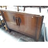 An oak veneered sideboard