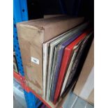 A box of vinyl records