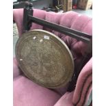 A brass topped Indian folding table