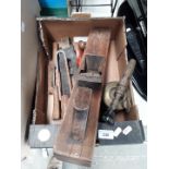 A box containing vintage wooden plane/ blowtorch