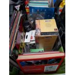 A box of bric a brac to include few LPs, fishing equipment, etc