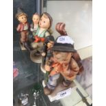 Four Hummel figures