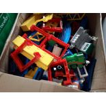 A box of Thomas the Tank Engine engines and track