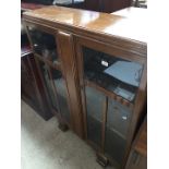 A 1930s glazed bookcase cabinet