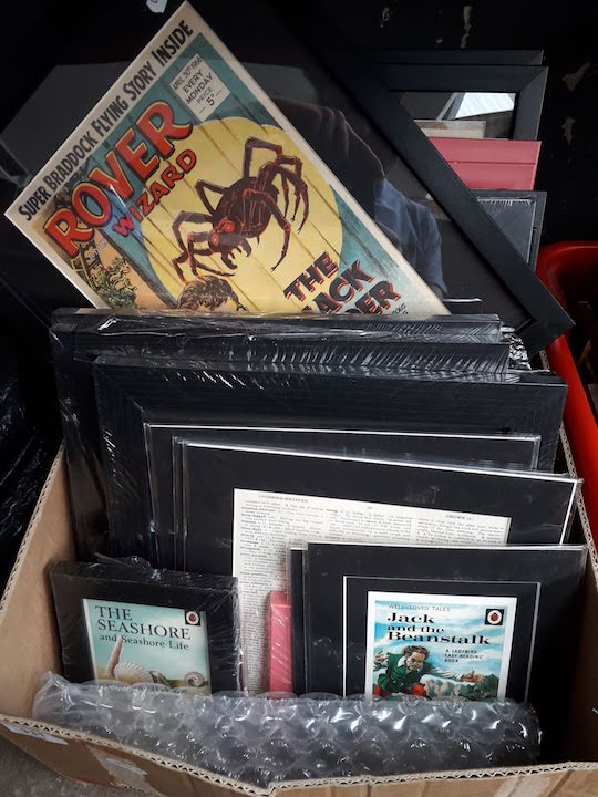 A box of original framed comics / lobby cards, etc