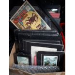 A box of original framed comics / lobby cards, etc