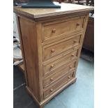 A pine chest of drawers