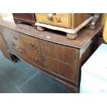 A mahogany bow front sideboard