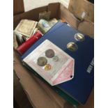 A box of coins and banknotes