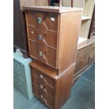 A pair of vintage teak bedside cabinets