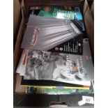 A box of football programmes including Finals