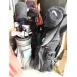 3 sets of golf clubs and bags
