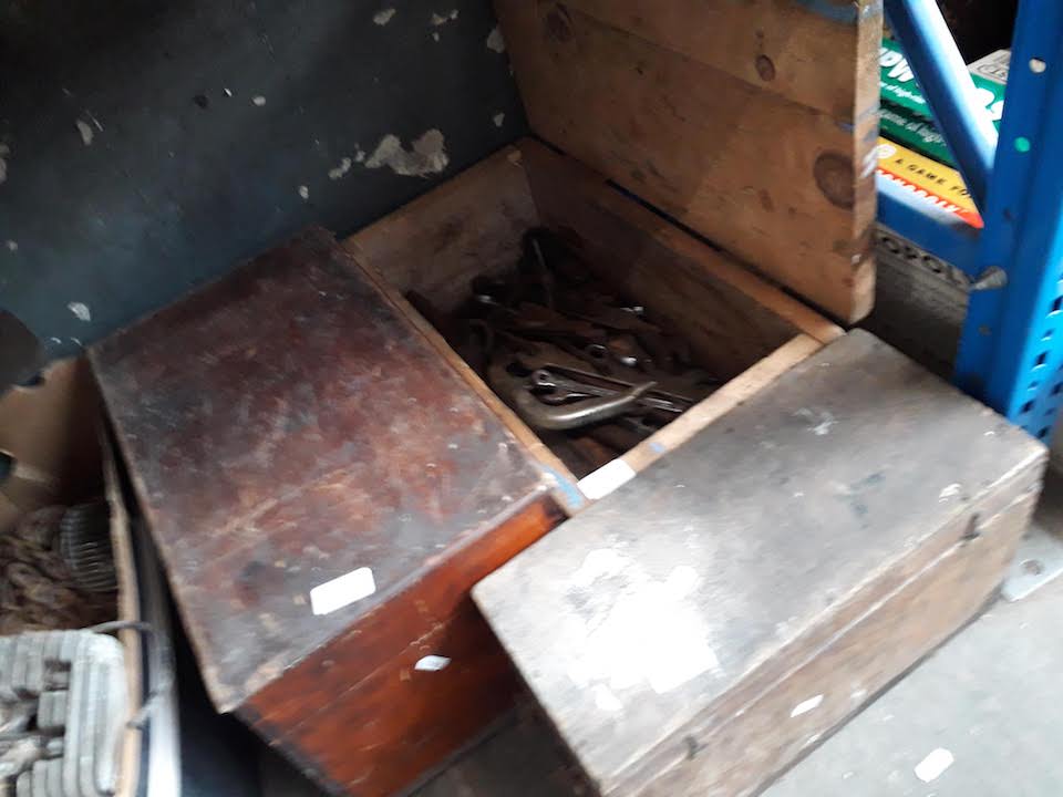 Three wooden boxes with tools