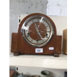 A mantel clock with Westminster chime