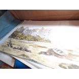 A box of paintings and prints