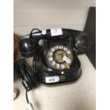 Bakelite telephone with metal dial