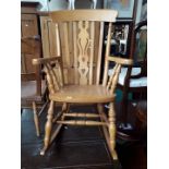 A pine rocking chair