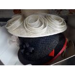 A box of ladies wedding hats