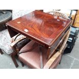 A mahogany drop end occasional table