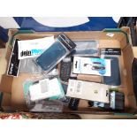 A box of mobile phones and accessories