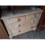 A pine chest of drawers