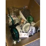 A box of items including Portmeirion and art glass