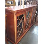 A yew wood bookcase cabinet