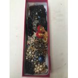 A box of brooches