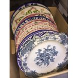 A box of pottery collectors plates to include blue and white, etc