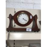 A inlaid Edwardian working Swiss mantle clock and plates stands