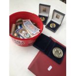 A tub of world coins and banknotes