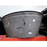 A galvanised oval tub