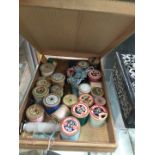 Wooden box of cotton bobbins