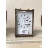 A solid brass Smith's carriage clock