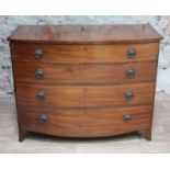 A George III bow front mahogany chest of drawers, boxwood stringing, brass handles and splayed