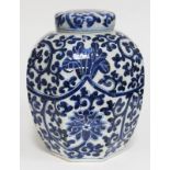 A Chinese porcelain ginger jar and cover of octagonal form and decorated in blue white with lotus