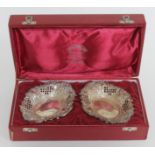 A cased pair of silver bon bon dishes of typical form, wt. 4oz.