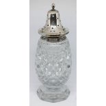 A hallmarked silver top and cut glass sugar castor, height 16.5cm.