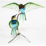 A Swarovski Paradise Birds bee eaters on metal stand, height 29cm. Condition - good, no damage/