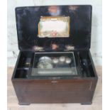 A Swiss 10 airs drums and bells cylinder music box, case width 57cm. Condition - 5 teeth broken (one