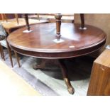 A Victorian mahogany breakfast table.