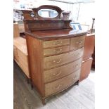 A good quality Edwardian inlaid and cross banded mahogany bow front chest of drawers with mirrored