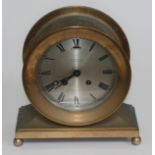 An unusual American ship's bulkhead clock, the silvered dial inscribed 'Terry & Compy Manchester