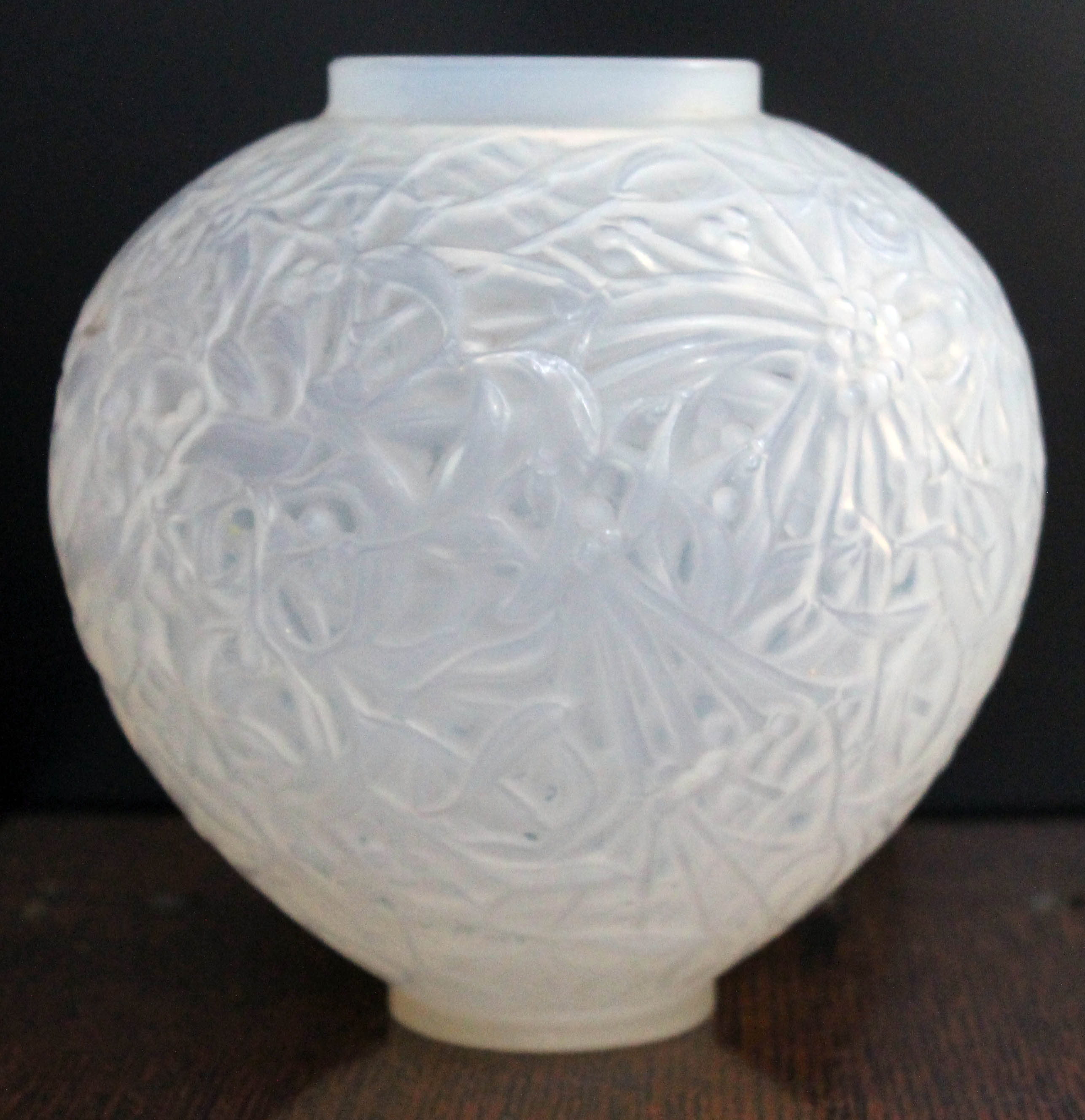 A Lalique Gui vase, etched 'R. Lalique France No. 948', height 16.5cm. Condition - chip to foot