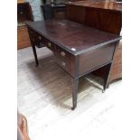 A mahogany writing table with gilt brass handles, width 122cm, depth 60cm & height 77cm.