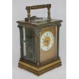 A late 19th century French four glass carriage clock with twist pillars and Corinthian capitals,