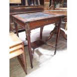 An Edwardian display table, height 76cm.