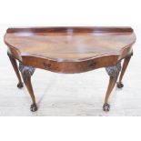 A Georgian style mahogany console table, early 20th century, with single drawer, cabriole legs with