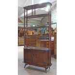 An Ercol dark elm Giraffe room divider bookcase, width 89cm, depth 41cm & height 191cm.