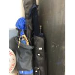 Three fishing bags complete with rods and a fishing pole in a bag